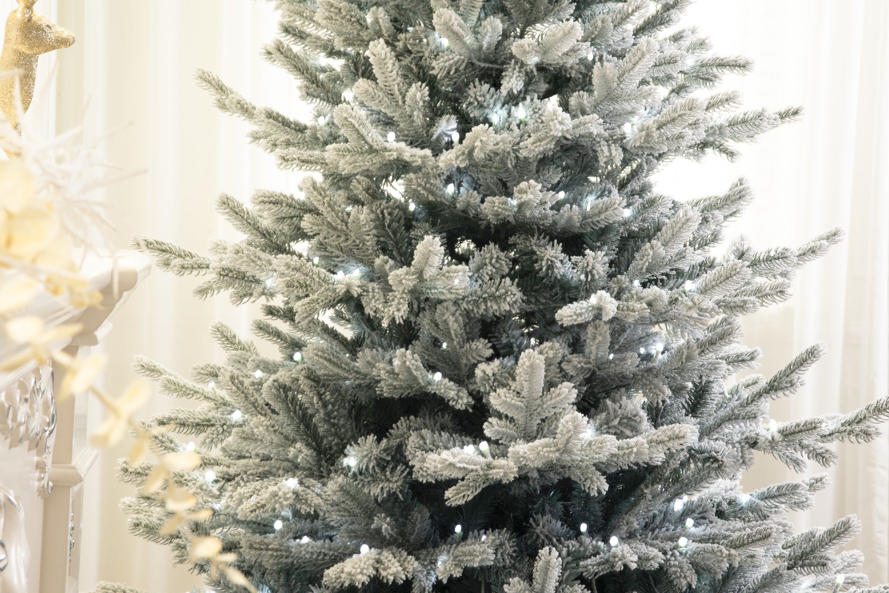 Snow Angel Blue Spruce Flocked Artificial Christmas Tree